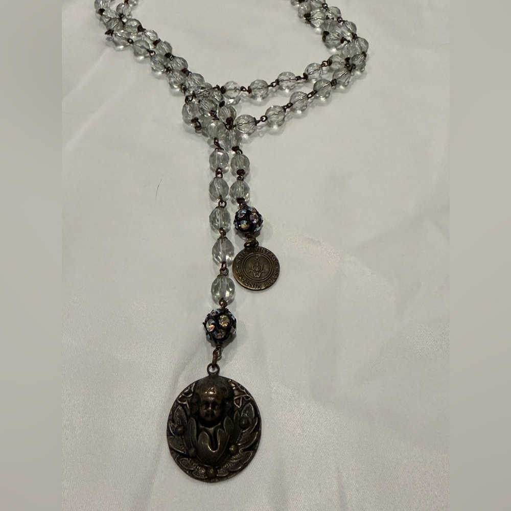 Saint Vintage Clear Beaded Necklace with cherub charm.